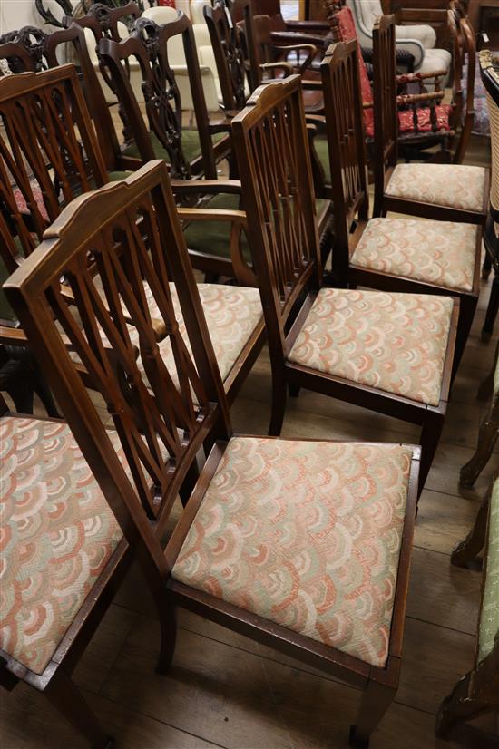A set of 6 Edwardian mahogany dining chairs (2 with arms)